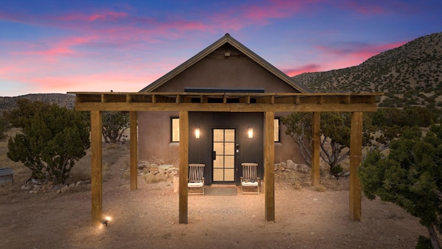 exterior space featuring a mountain view