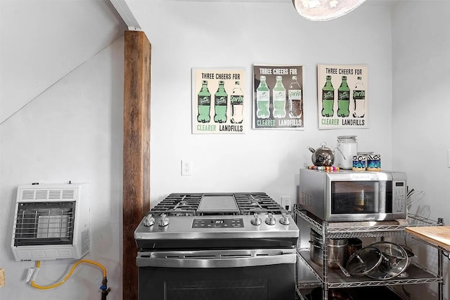 kitchen featuring heating unit and stainless steel appliances