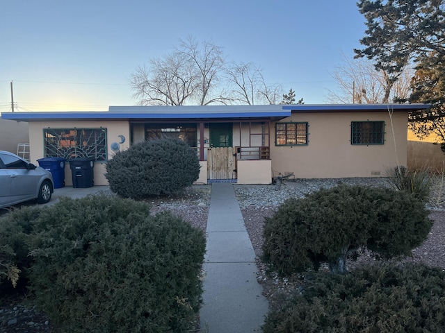 view of front of property featuring stucco siding