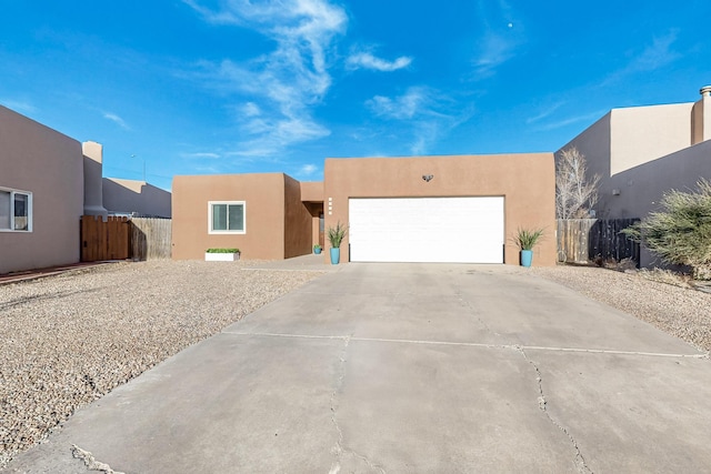 adobe home with a garage