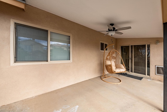 view of patio / terrace featuring ceiling fan