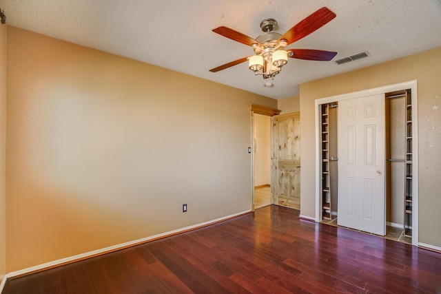 11001 Alta Dr NW, Albuquerque, NM 87114 - unfurnished bedroom with baseboards, visible vents, a closet, and wood finished floors