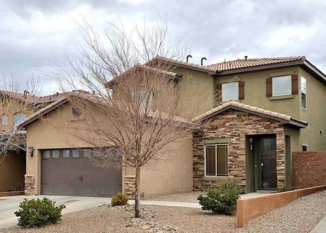 view of front of home with a tile roof, stucco siding, a garage, stone siding, and driveway