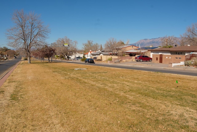 view of yard featuring a residential view