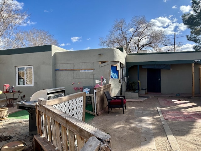 exterior space with a patio area