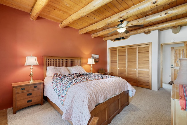 506 Dinkle Rd, Edgewood, NM 87015 - bedroom with a closet, beamed ceiling, ceiling fan, wooden ceiling, and light colored carpet