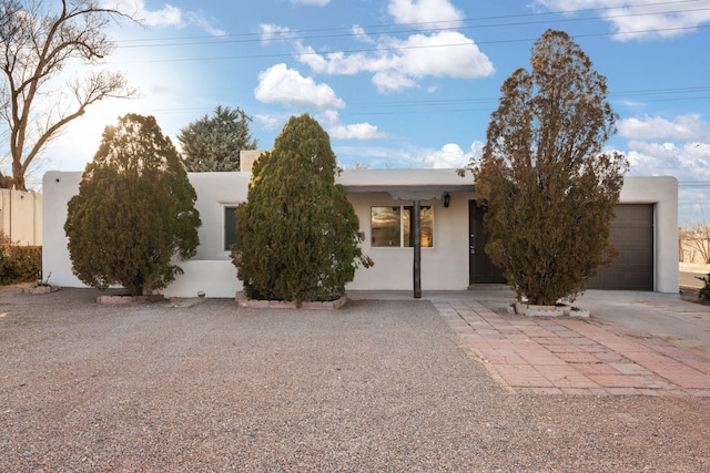 adobe home with a garage