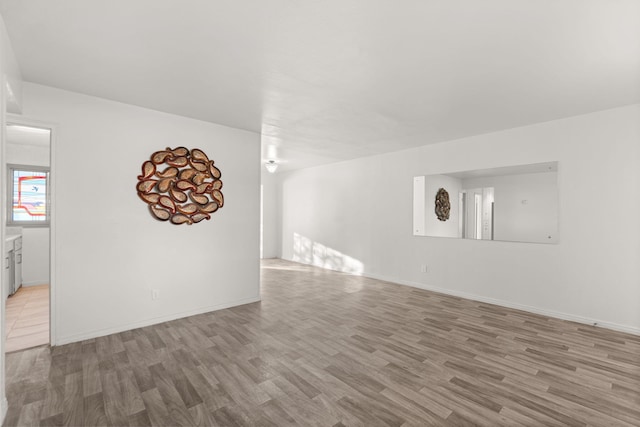 unfurnished living room featuring light hardwood / wood-style floors