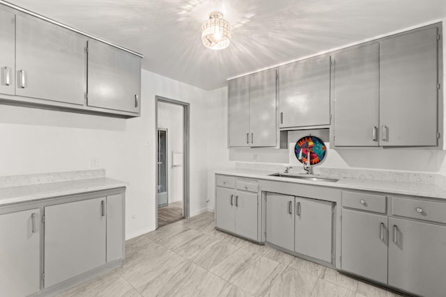 kitchen featuring gray cabinetry