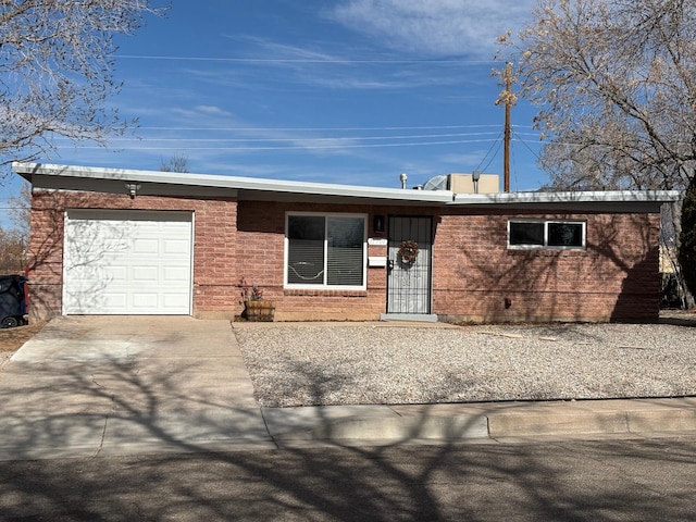 single story home with a garage