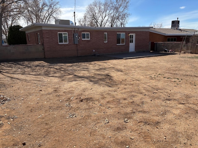 rear view of house featuring a patio