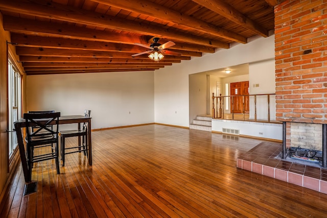 dining space featuring ceiling fan, wood finished floors, and visible vents