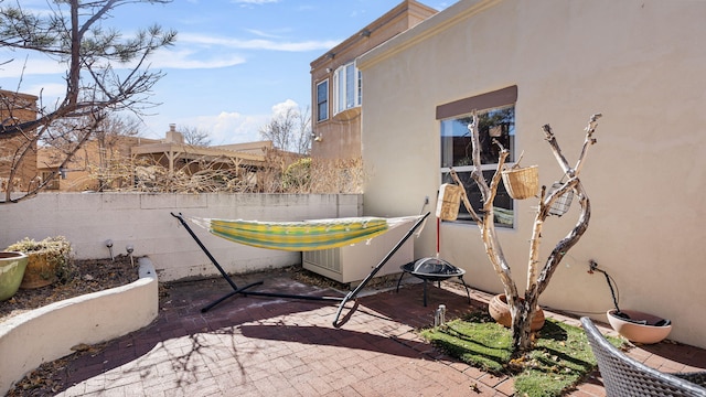 view of patio with fence