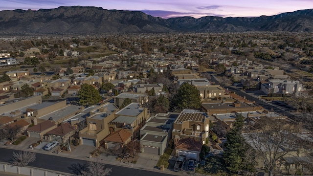 birds eye view of property featuring a residential view and a mountain view