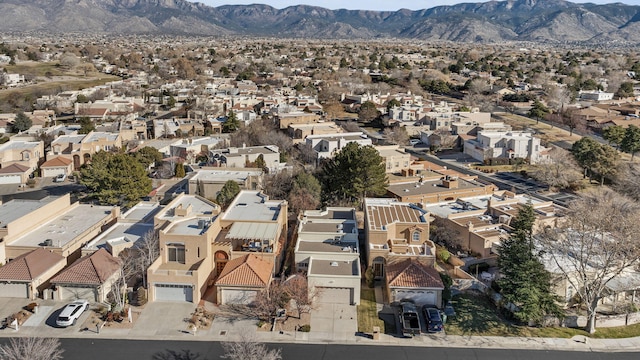 bird's eye view featuring a residential view and a mountain view