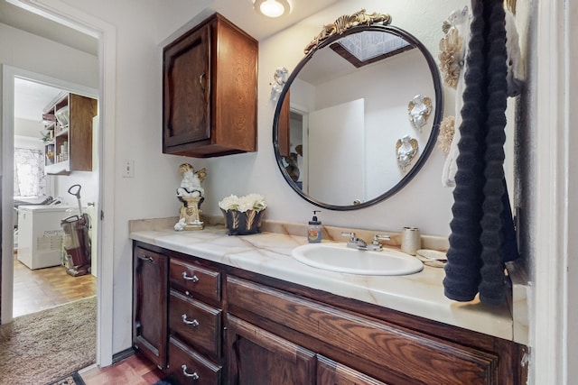 bathroom with vanity and wood-type flooring