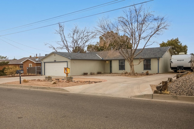 ranch-style home with a garage