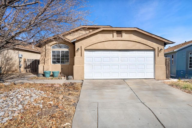 ranch-style house featuring a garage