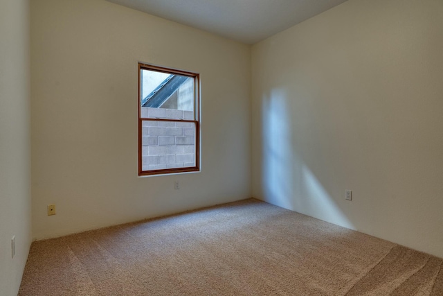 empty room with carpet flooring