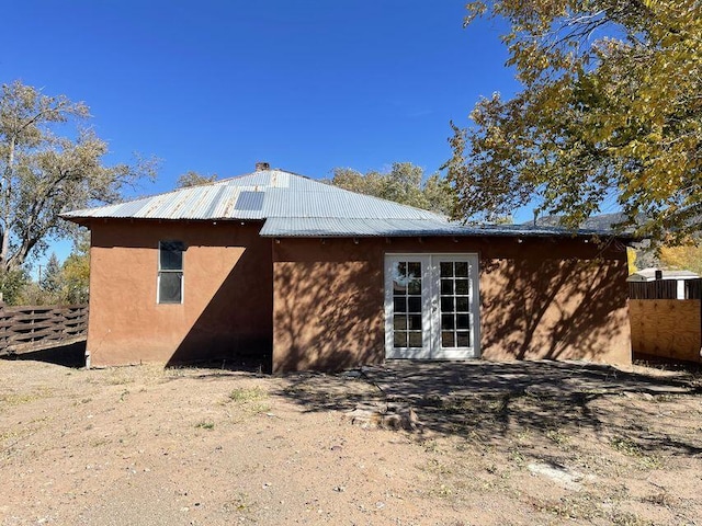 back of property with french doors