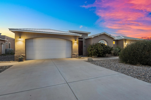 view of front of home with a garage