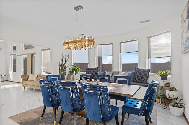 dining room featuring an inviting chandelier