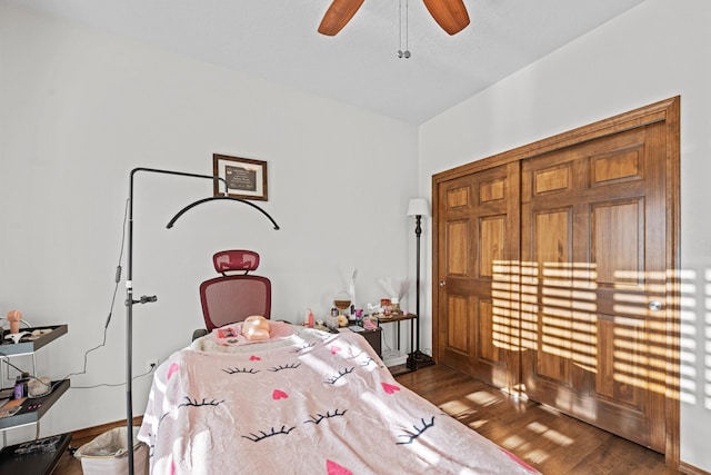 game room with hardwood / wood-style flooring and ceiling fan