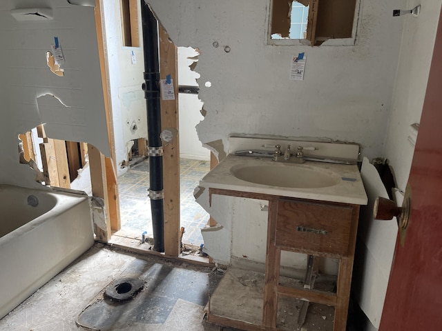 bathroom featuring sink and a bathtub