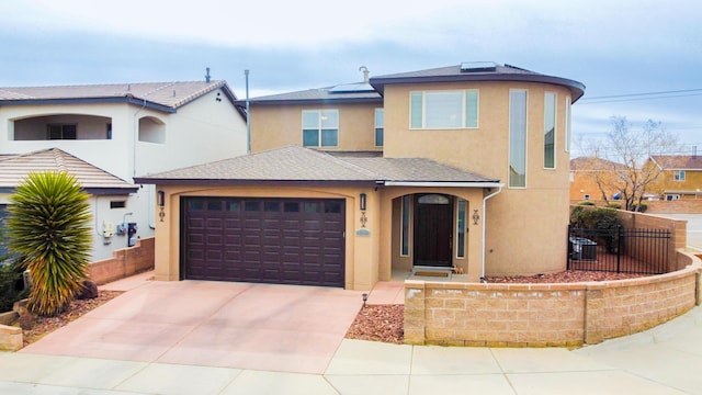 view of front of property with a garage