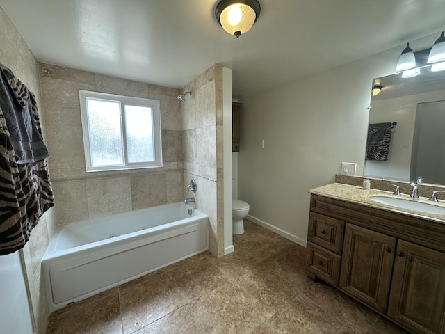 full bathroom featuring toilet, bathtub / shower combination, baseboards, and vanity