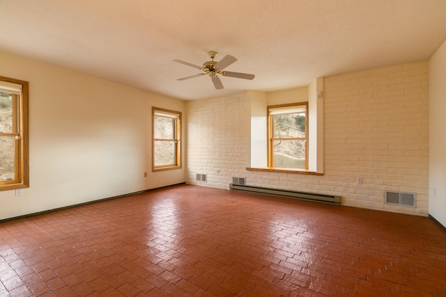 unfurnished room featuring a textured ceiling, ceiling fan, and baseboard heating