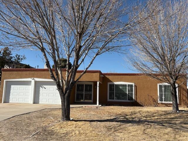 single story home with a garage