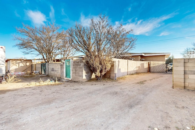 view of yard featuring a gate and fence