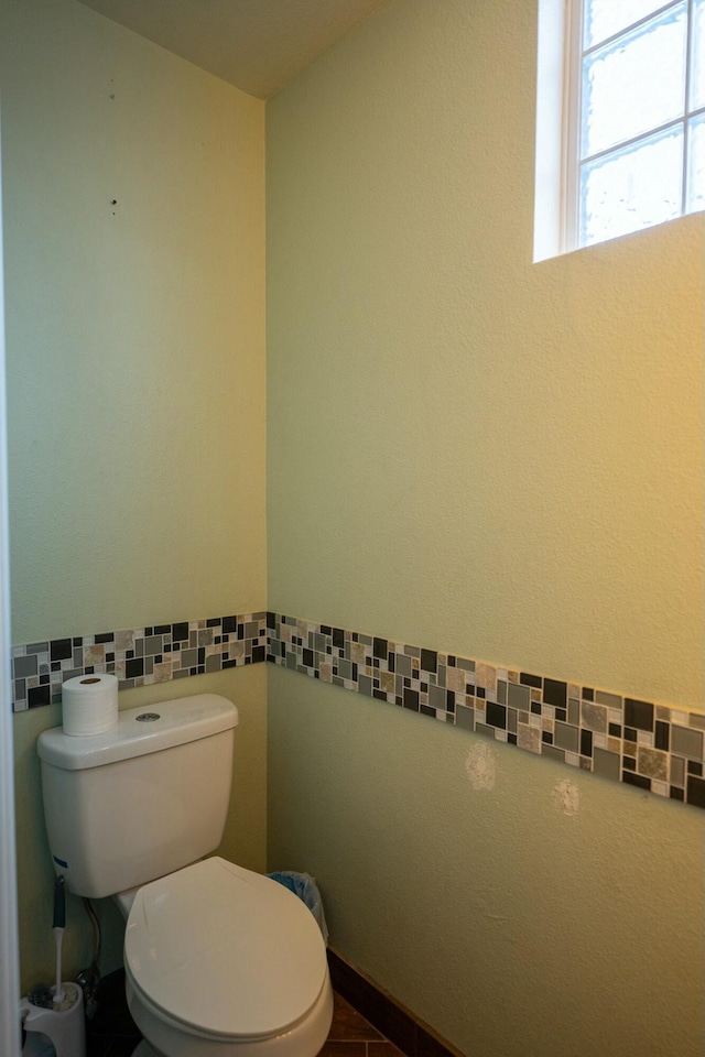 bathroom featuring toilet