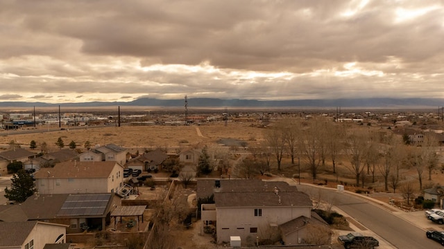 bird's eye view featuring a residential view and a mountain view