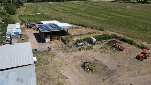 birds eye view of property with a rural view