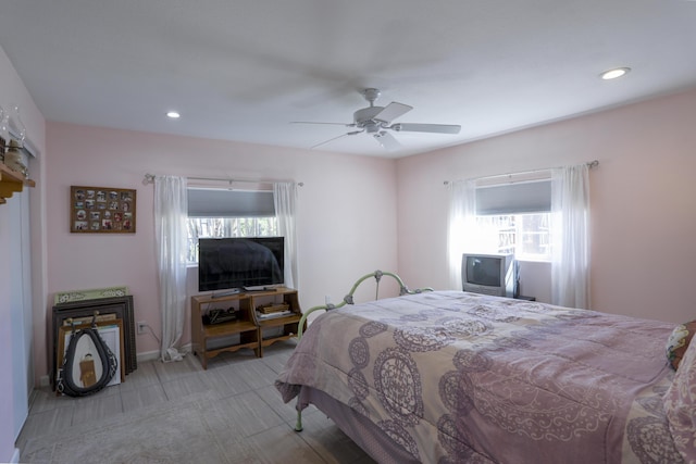 bedroom with a ceiling fan and recessed lighting