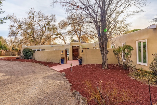 view of pueblo revival-style home