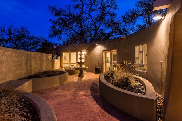 view of patio at night