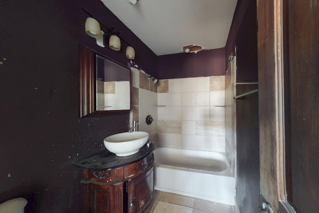 bathroom featuring  shower combination, tile patterned floors, and vanity