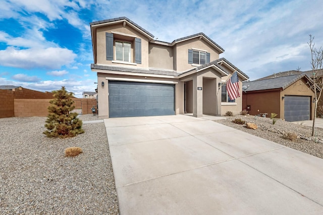 view of front of property with a garage