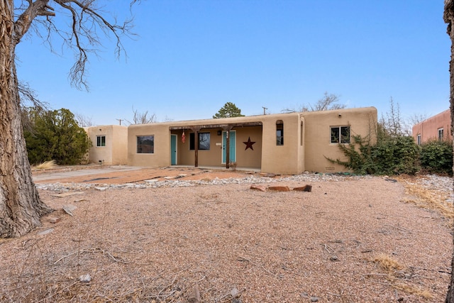 view of pueblo revival-style home