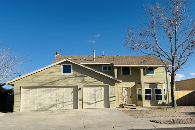 view of front of home with a garage