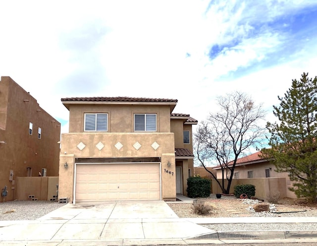 view of front of home with a garage