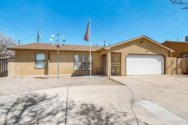 single story home featuring a garage