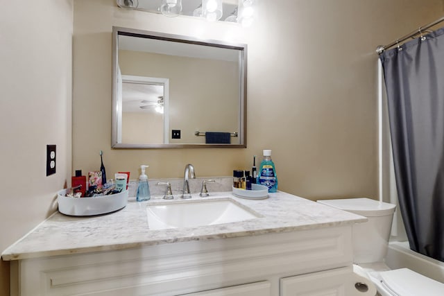full bathroom with vanity, toilet, and shower / bath combo