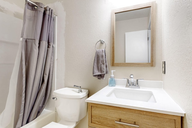 full bathroom featuring toilet, shower / tub combo with curtain, and vanity