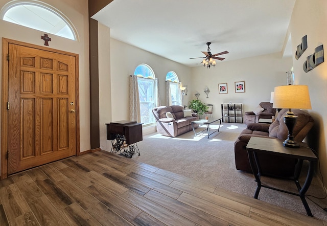 foyer featuring wood finished floors and a ceiling fan