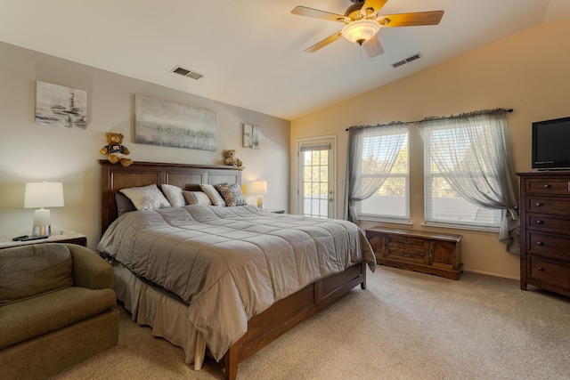 bedroom with vaulted ceiling, ceiling fan, light carpet, and visible vents