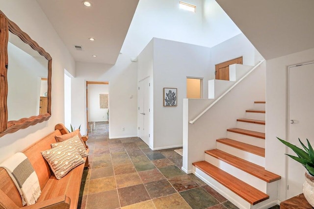 5524 Poblanos Ct NW, Albuquerque, NM 87107 - stairway featuring stone tile floors and recessed lighting